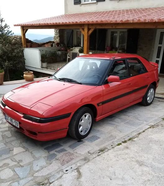 Mazda 323 • 1990 • 158,000 km 1