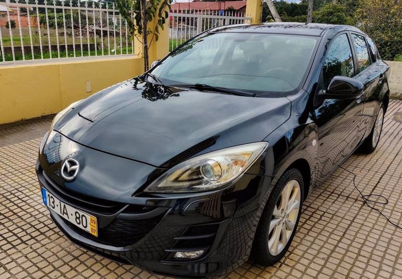 Mazda 3 • 2009 • 179,999 km 1