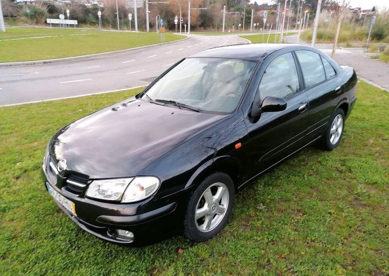 Nissan Almera • 2001 • 180,000 km 3