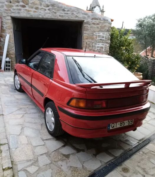 Mazda 323 • 1990 • 158,000 km 2
