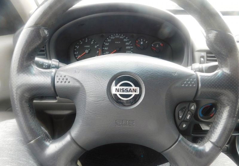 Nissan Almera • 2001 • 200,000 km 4