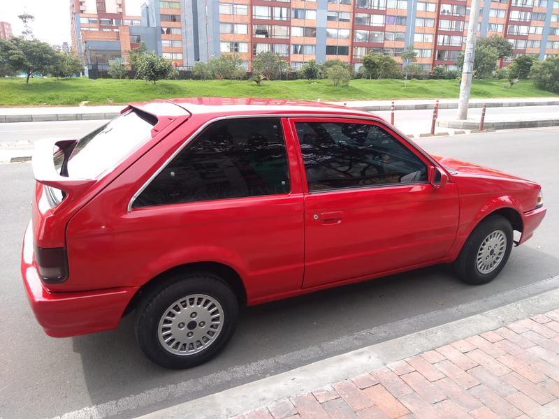 Mazda 323 • 1990 • 150,000 km 1