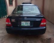 Mazda 323 • 2000 • 131,913 km 4