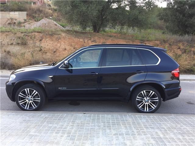 BMW X5 • 2010 • 212,000 km 11