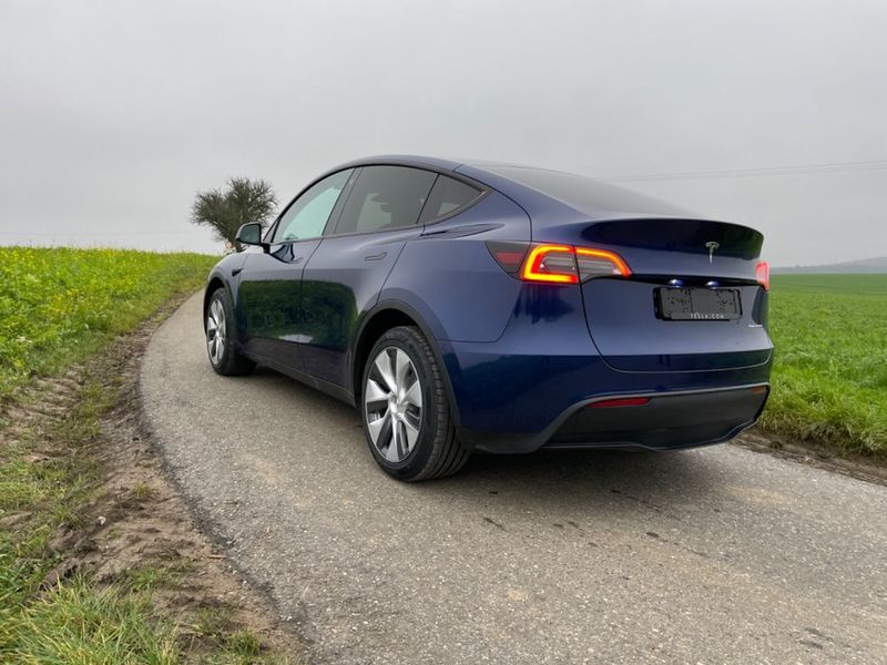 Tesla Model Y • 2021 • 18,730 km 3
