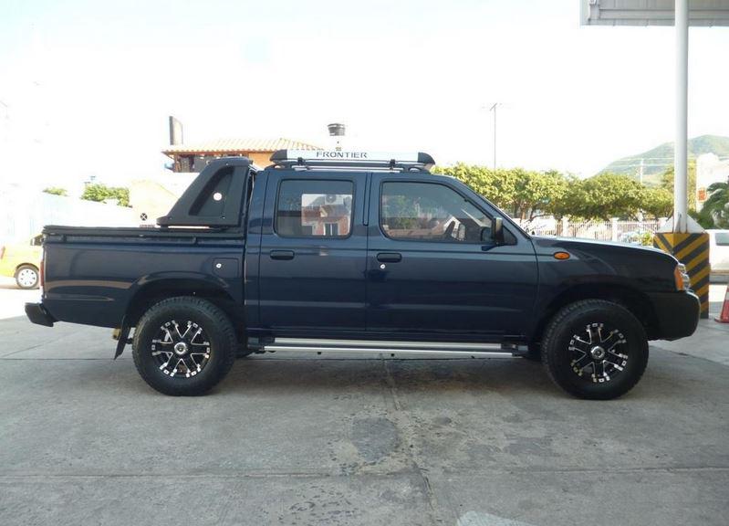 Nissan Frontier • 2012 • 100,000 km 1