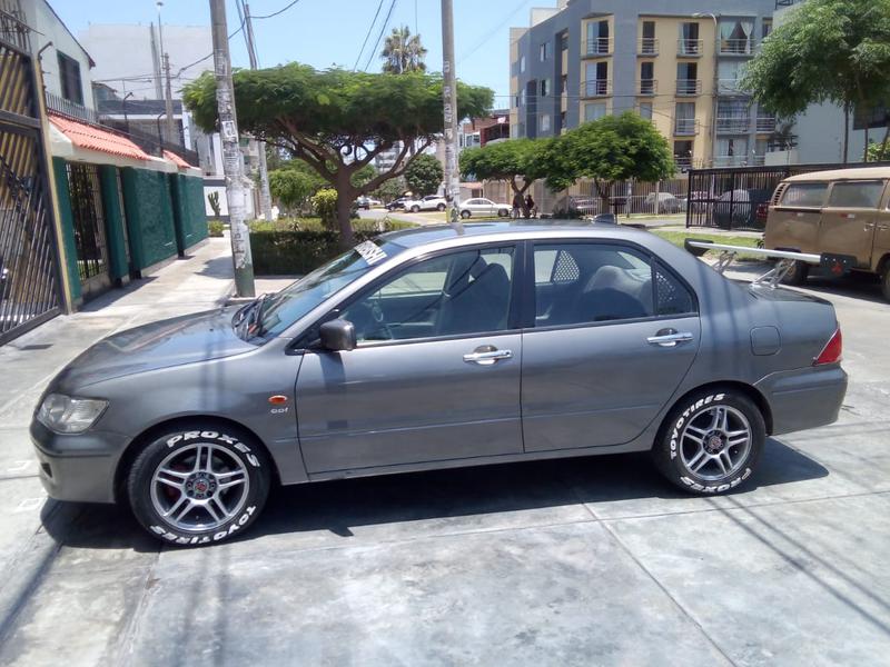 Mitsubishi Lancer • 2000 • 153,000 km 10