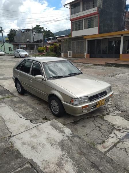 Mazda 323 • 1998 • 179,000 km 2