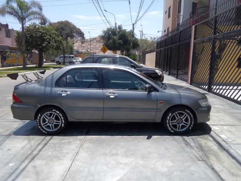 Mitsubishi Lancer • 2000 • 153,000 km 1