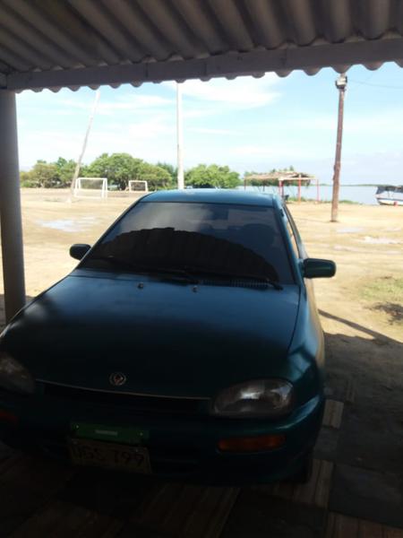 Mazda 121 • 1998 • 250,000 km 1