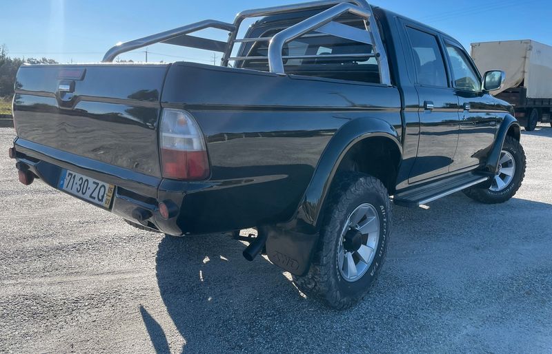 Mitsubishi L200 • 2005 • 200,000 km 2