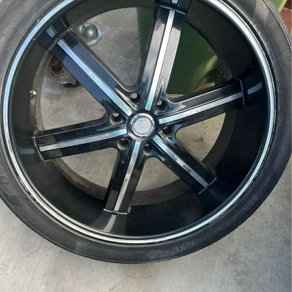 24" Chevy rims 305/35/24 tires  3