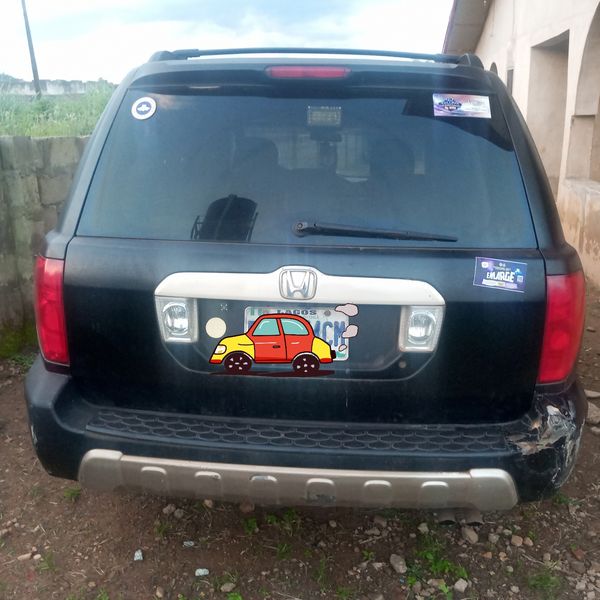 Honda Pilot • 2003 • 128,816 km 2