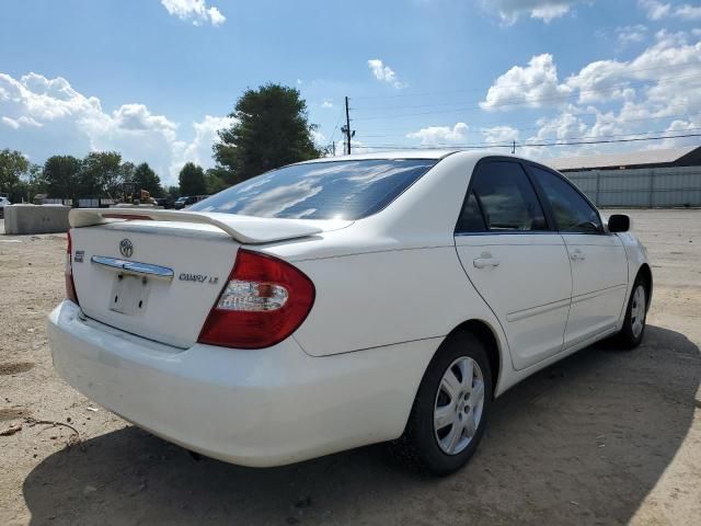 Toyota Camry • 2004 • 12 km 7