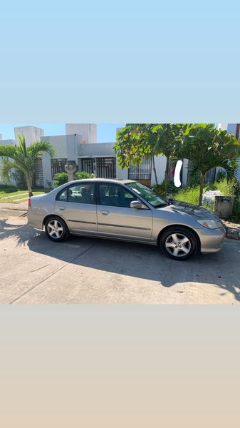 Honda Civic • 2004 • 100,000 km 1