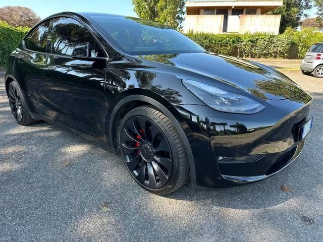Tesla Model Y • 2023 • 59,000 km 7