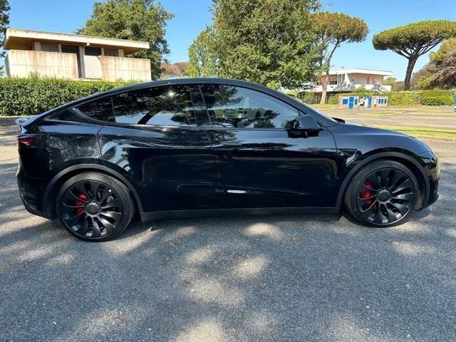 Tesla Model Y • 2023 • 59,000 km 6