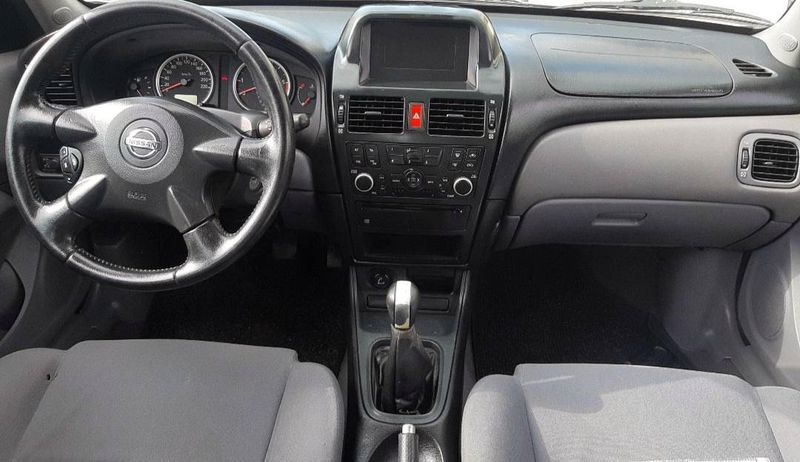 Nissan Almera • 2003 • 250,000 km 2
