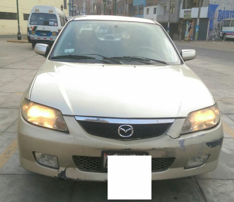 Mazda 323 • 2004 • 155,000 km 4