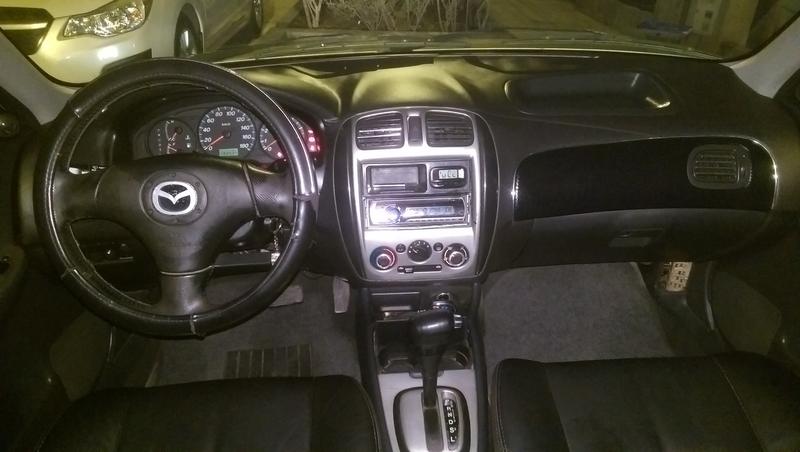 Mazda 323 • 2004 • 155,000 km 5