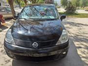 Nissan Tiida • 2012 • 272,000 km 4