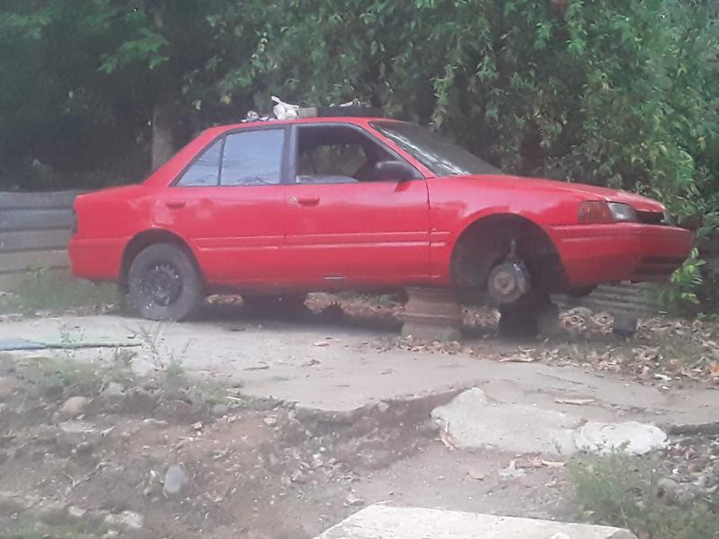 Mazda 323 • 1996 • 250,000 km 1