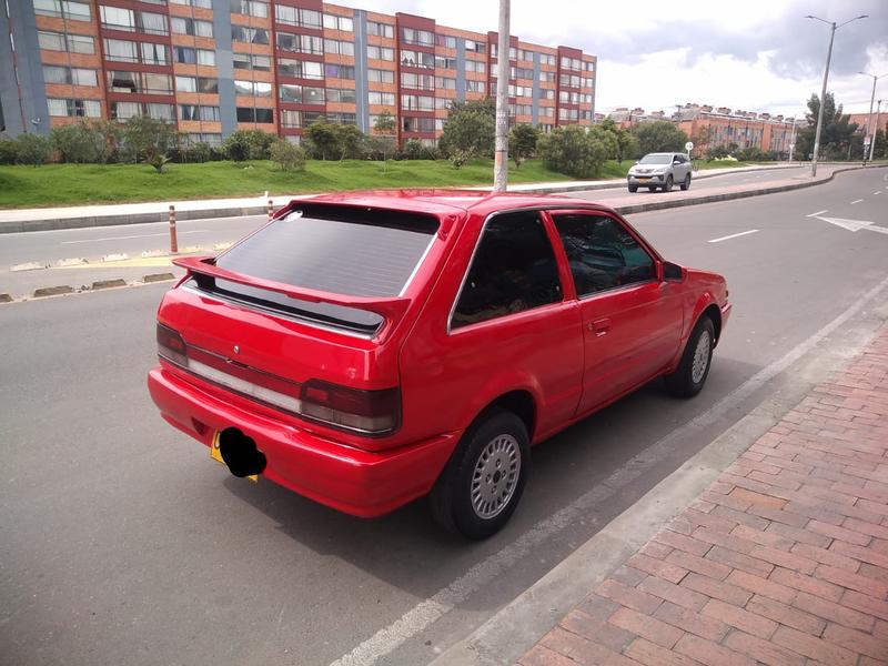 Mazda 323 • 1990 • 150,000 km 3