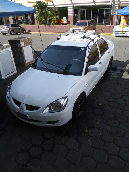 Mitsubishi Lancer • 2005 • 250,000 km 4