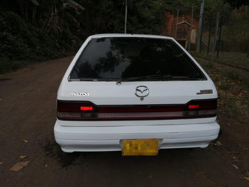 Mazda 323 • 1995 • 1,250 km 2