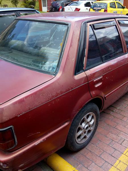 Mazda 323 • 1996 • 1,234 km 2