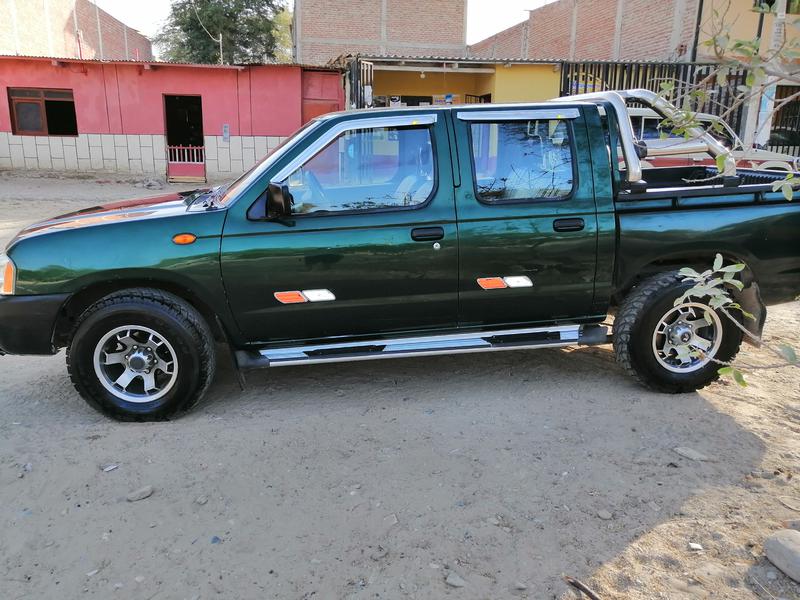 Nissan Frontier • 2009 • 250,000 km 3