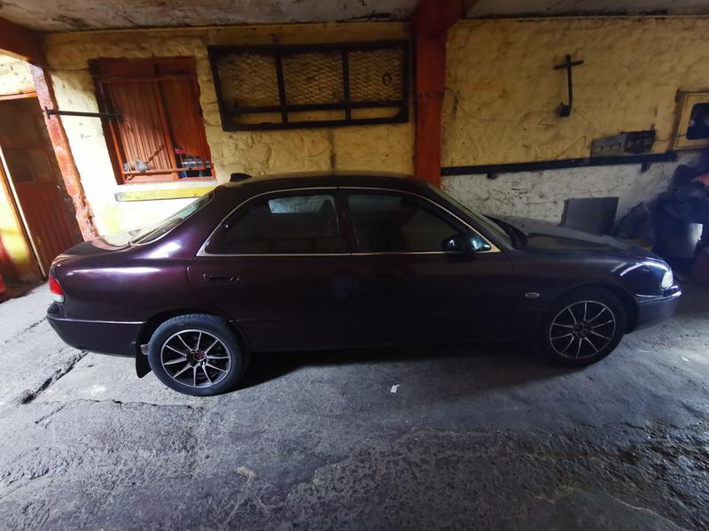 Mazda 323 • 1994 • 80,000 km 2