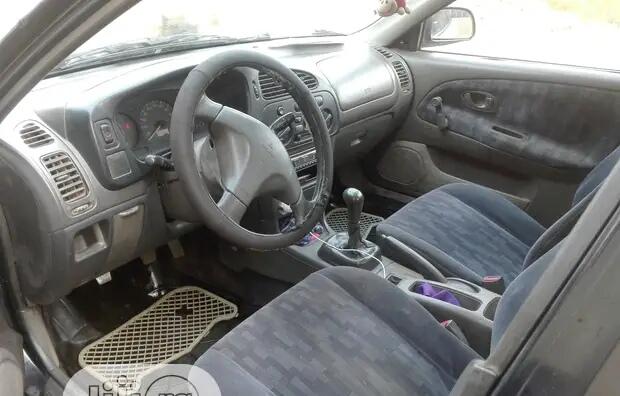 Mitsubishi Lancer • 2000 • 1,245,783 km 3