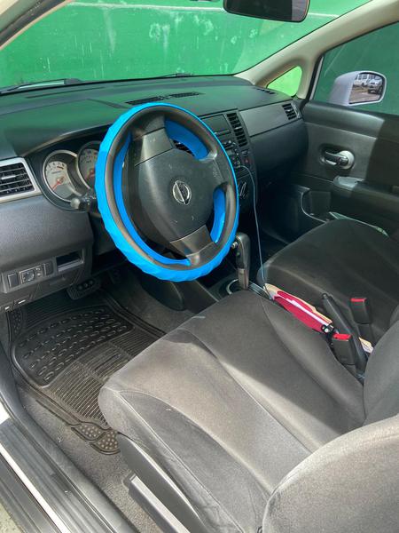 Nissan Tiida • 2009 • 148,319 km 2