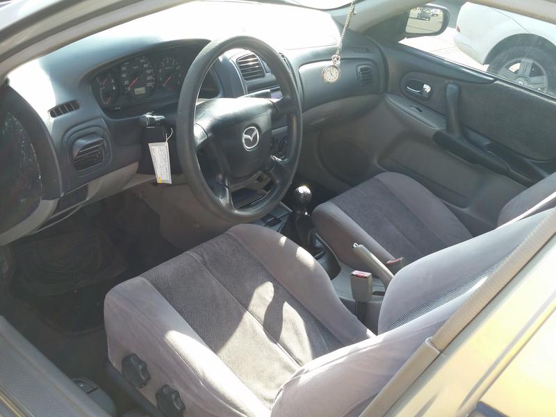 Mazda 121 • 2003 • 145,000 km 1