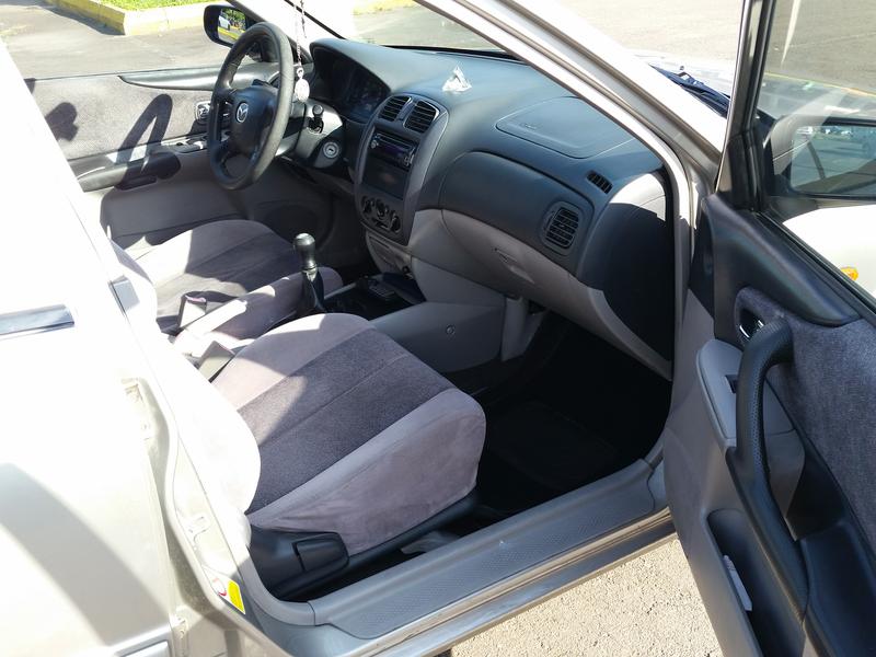 Mazda 121 • 2003 • 145,000 km 10