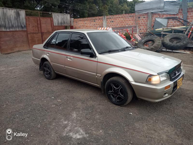 Mazda 323 • 2002 • 1 km 1