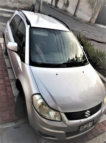 Suzuki SX4 • 2008 • 165,000 km 2