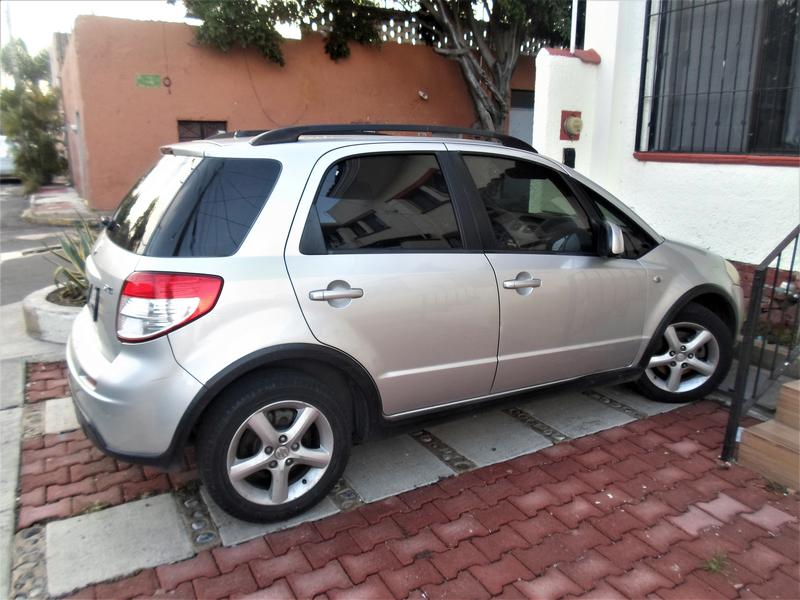 Suzuki SX4 • 2008 • 165,000 km 1