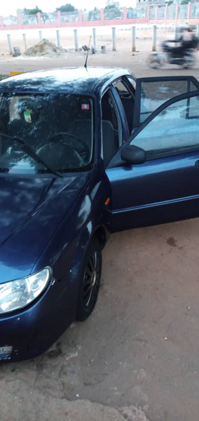 Mazda 323 • 2002 • 241,000 km 4