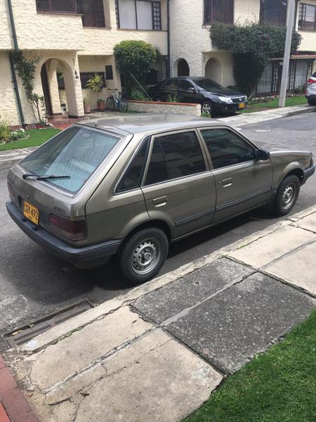 Mazda 323 • 1990 • 126,000 km 8