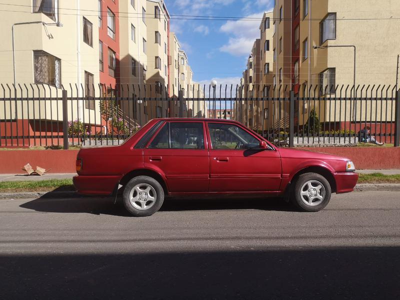 Mazda 323 • 1997 • 250,000 km 1
