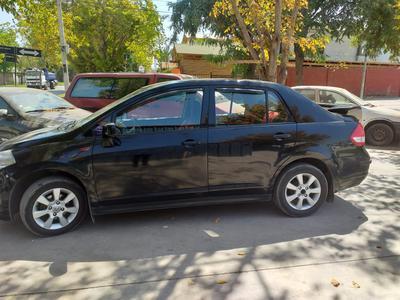 Nissan Tiida • 2012 • 272,000 km