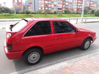 Mazda 323 • 1990 • 150,000 km