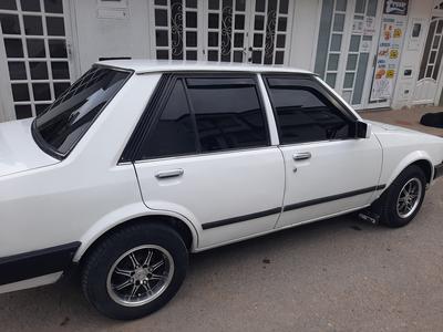 Mazda 323 • 1984 • 174,000 km