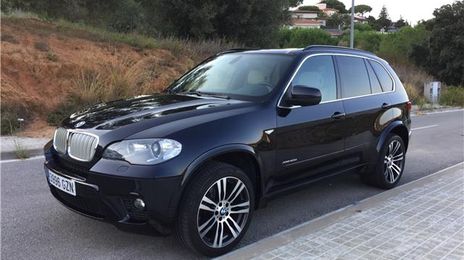 BMW X5 • 2010 • 212,000 km