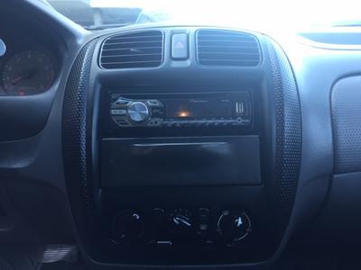 Mazda 323 • 1999 • 260,000 km