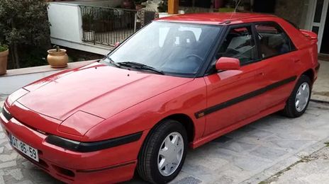 Mazda 323 • 1990 • 158,000 km