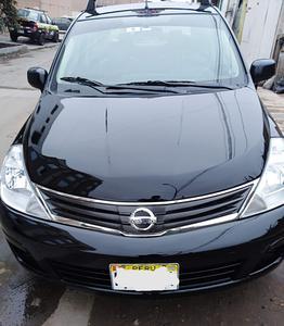 Nissan Tiida • 2013 • 300,000 km