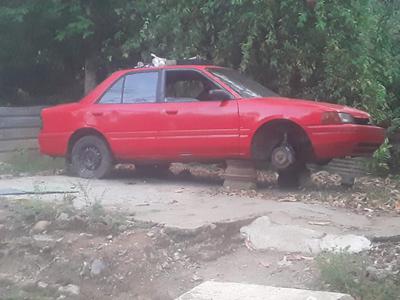 Mazda 323 • 1996 • 250,000 km